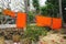 Orange monk robes hang on a clothesline at a Buddhist monastery in Luang Prabang, Laos