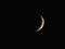 Orange Moon in Waxing Crescent Phase