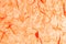 Orange mulberry paper. Abstract background of natural fiber paper. Top view for copy spaces, designs, and advertisements