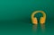 Orange Noise canceling headphones icon  on green background. Headphones for ear protection from noise