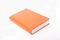 Orange notepad with bookmarks