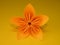 Orange origami flower