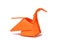 Orange origami swan over white
