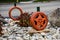 Orange Painted tires as a autumn decoration in rocks