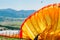 Orange parachute lying on the ground