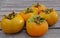 Orange persimmon kaki fruits