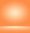 Orange photographic studio background vertical with soft vignette. Soft gradient background. Painted canvas studio