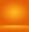 Orange photographic studio background vertical with soft vignette. Soft gradient background. Painted canvas studio
