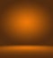 Orange photographic studio background vertical with soft vignette. Soft gradient background. Painted canvas studio