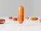 Orange pill floating in white studio with white capsules around. Covid-19 medicine. Collagen, supplements, painkillers