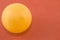 Orange ping pong ball