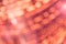 Orange pink defocused round bokeh texture background, luxury ba
