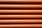 Orange pipe made of polyvinyl chloride