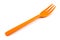 Orange plastic forks isolated