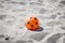 Orange plastic soccer ball
