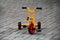 Orange playground tricycle