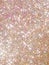 Orange polarization pearl sequins, shiny glitter background