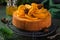 Orange polenta and almond cake decorated with candied orange sl