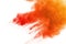 Orange powder explosion on white background. Colored cloud. Colorful dust explode. Paint Holi.