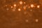 orange pretty shining glitter lights defocused bokeh abstract background, holiday mockup texture with blank space for your content