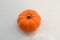 Orange pumkin on white background