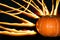 Orange pumpkin on background of fire lines, copy space