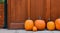 orange pumpkins in front of a house, concept halloween october of fear and terror