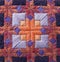 Orange and Purple Needlepoint Detail