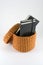 Orange rattan basket with notebooks