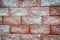 Orange red coral wall closeup bricks background texture