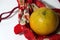 Orange on the red fabric bag on white floor