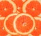 Orange red roud slices cut for background