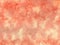 Orange red washed color on distressed vintage grunge background texture