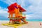 Orange, red and yellow lifeguard tower in world famous Miami Beach