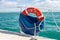 Orange rescue wheel on a catamaran used for sea world watching cruises in Western Australia