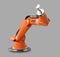 Orange robotic arm isolated on gray background