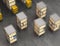 Orange robots carrying pallets with goods in modern warehouse