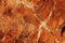 Orange rock granite interspersed texture background