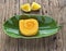 Orange roll cake on banana leaf plate