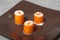Orange rolls with red caviar. Molecular kitchen