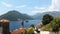 Orange roofs of Perast town and small islands - bay of Kotor in Montenegro