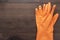 Orange rubber cleaning gloves