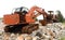 orange rusty, worn out bulldozer excavators