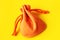 Orange sack for gifts on yellow background