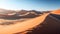 orange sand dune desert with clear blue sky AI generated image