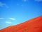 Orange sand of the Wahiba desert and blue sky, Oman