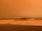 Orange sea without filters. Sandstorm from the Sahara in Europe
