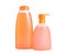 Orange shampoo and liquid soap isolated