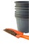 Orange shovel and flower pots