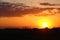 Orange silhouette prairie Saskatchewan sunset